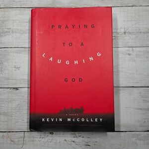 Praying to a Laughing God by Kevin McColley – Pre-Owned